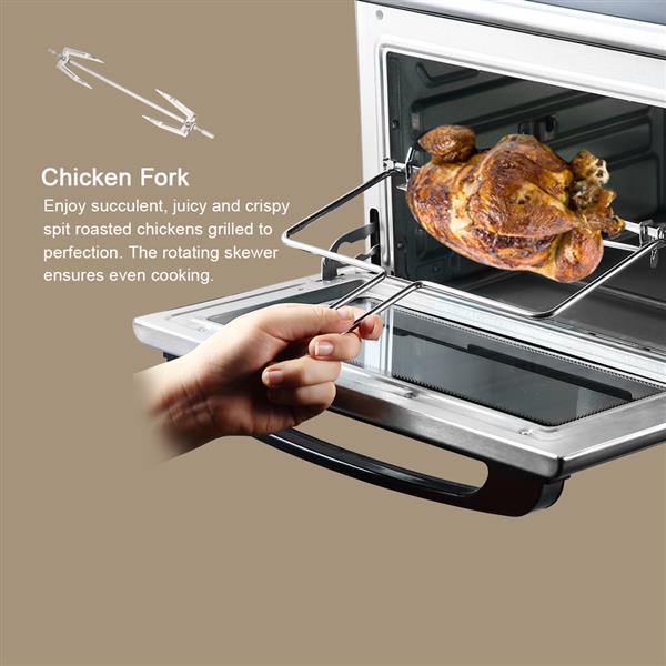 Chicken fork being used to rotate a roasted chicken inside a large capacity air fryer.